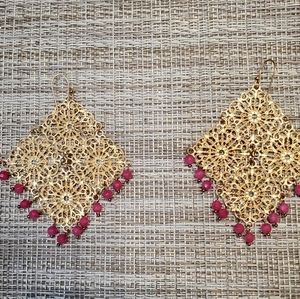 Gold earrings with pink stones